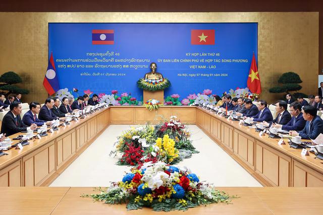 The Vietnam-Laos Intergovernmental Committee for Bilateral Cooperation met in Hanoi on January 7. Photo: VGP