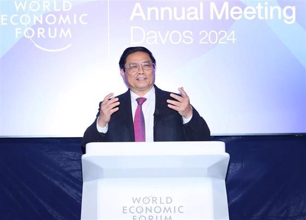 Prime Minister Pham Minh Chinh addressing the dialogue in Davos, Switzerland, on January 16 (local time). Photo: VNA