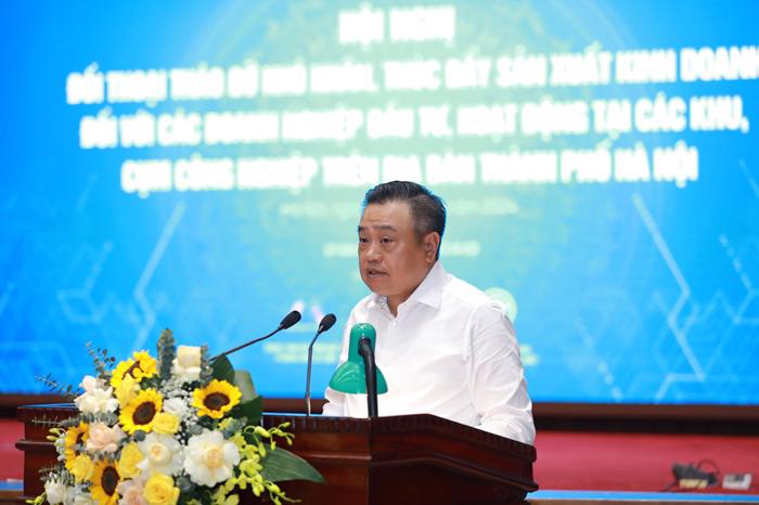 Ông Trần Sỹ Thanh, Chủ tịch UBND thành phố Hà Nội phát biểu khai mạc  hội nghị ngày 5/4.