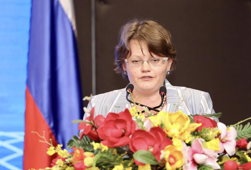 Ms. Bakeeva Ekaterina, Minister Counselor of the Embassy of Russia in Vietnam speaking at the forum. (Source: Viet Dung)