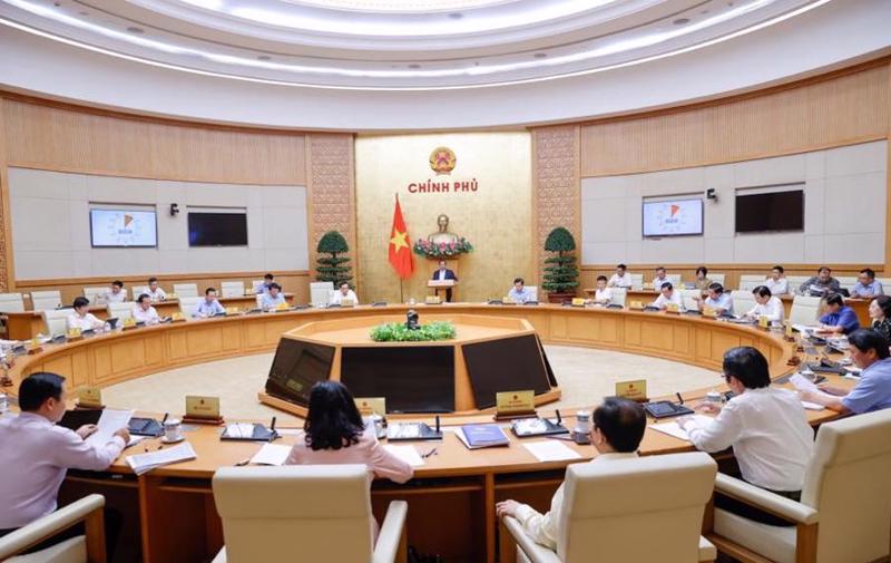 PM Pham Minh Chinh addressing the Government’s meeting on law building on June 13.