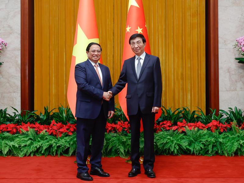 Thủ tướng Phạm Minh Chính hội kiến Chủ tịch Chính hiệp Trung Quốc Vương Hộ Ninh - Ảnh: VGP
