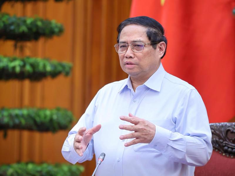 Prime Minister Pham Minh Chinh chairing the meeting held on July 22. 