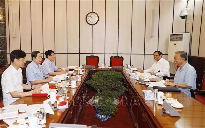 The key leaders'  meeting held to evaluate July performance and outline major tasks for August. Photo: VNA