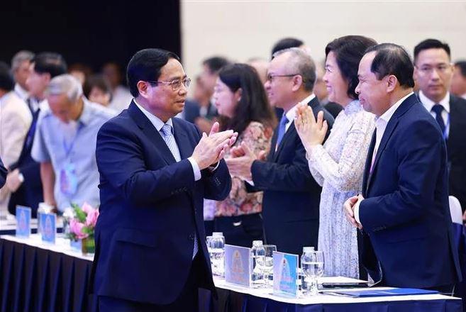 Prime Minister Pham Minh Chinh at the 2024 forum of overseas Vietnamese intellectuals and experts in Hanoi on August 22 (Photo: VNA)