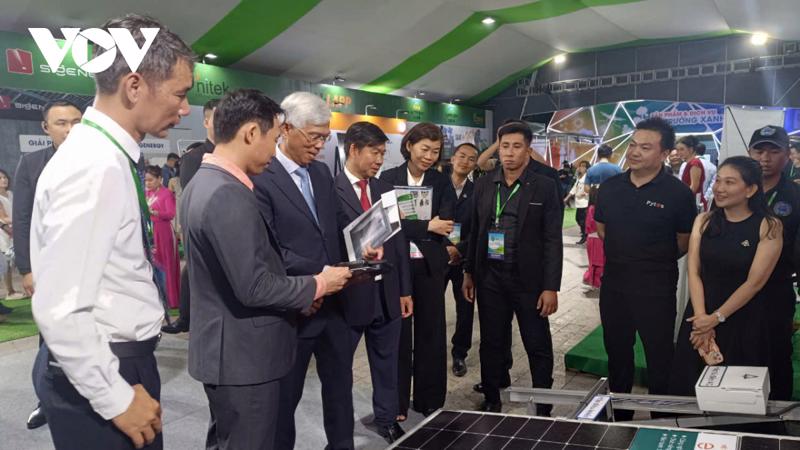 Delegates visit an exhibition booth at GRECO 2024.