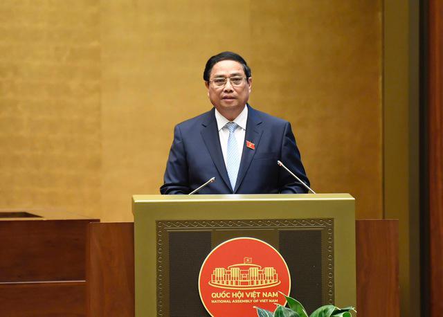 Prime Minister Pham Minh Chinh is addressing the 15th National Assembly's 8th session on November 12. (Photo: VGP)