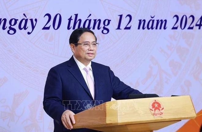 Prime Minister Pham Minh Chinh speaks at the conference. (Photo: VNA)