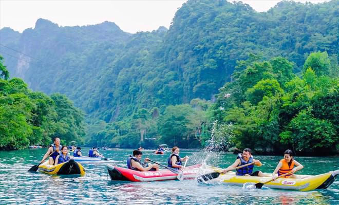 Tourists kayaking in Phong Nha-Ke Bang National Park, Quang Binh Province.