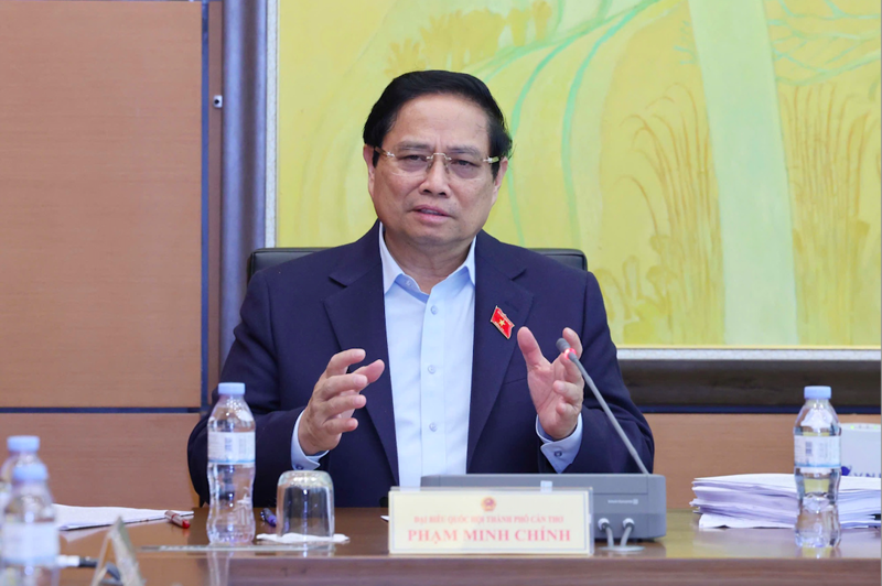 PM Pham Minh Chinh speaks at a NA's group discussion on February 15.