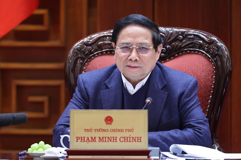 Prime Minister Pham Minh Chinh chairs the meeting held in Hanoi on December 23 to discuss the implementation slot 1xbet the project. (Photo: VGP)