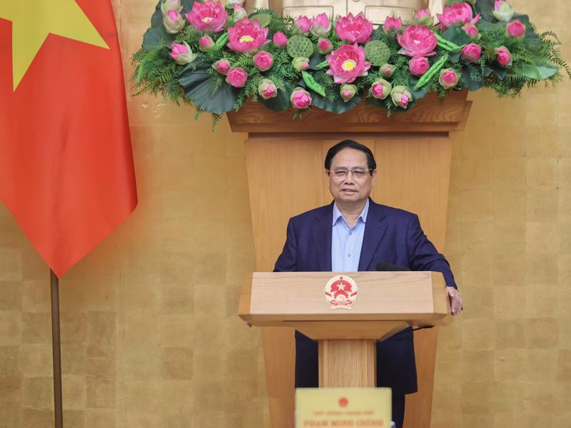 Prime Minister Pham Minh Chinh chairs the regular Government meeting in  Hanoi on March 5. 