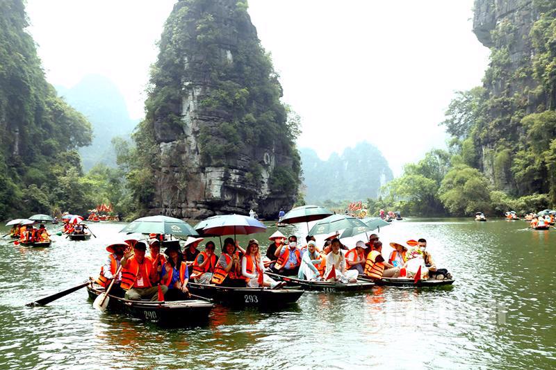 Tourists visit Trang An Complex in Ninh Binh province.