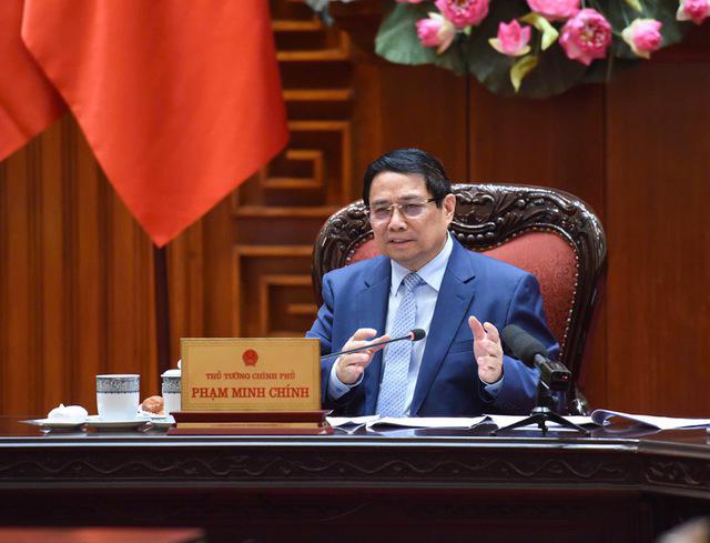 Prime Minister Pham Minh Chinh chairs a meeting to discuss tariff negotiation strategies with the U.S. in Hanoi on April 29.( Photo: VGP)