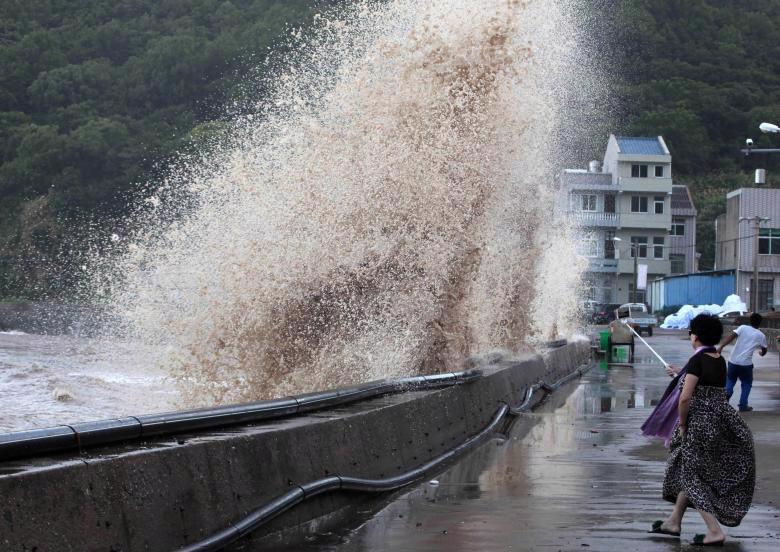 Hình ảnh tan hoang sau khi siêu bão Maria đổ bộ Trung Quốc - Ảnh 4.