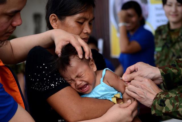 Bộ Y tế ra khuyến cáo trước tình hình dịch bại liệt ở Philippines - Ảnh 1.