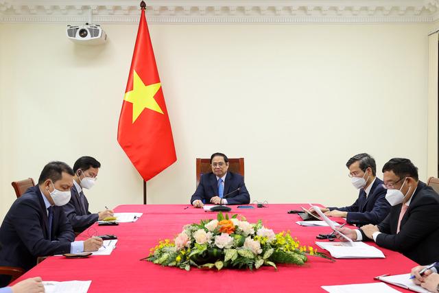 Thủ tướng Phạm Minh Ch&iacute;nh tại cuộc điện đ&agrave;m - Ảnh: VGP