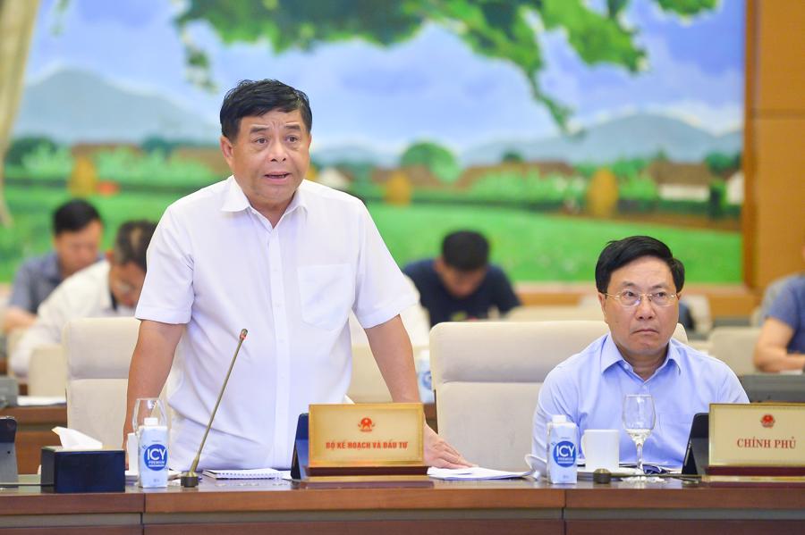 Bộ trưởng Bộ Kế hoạch v&agrave; Đầu tư Nguyễn Ch&iacute; Dũng tại phi&ecirc;n họp - Ảnh: Quochoi.vn