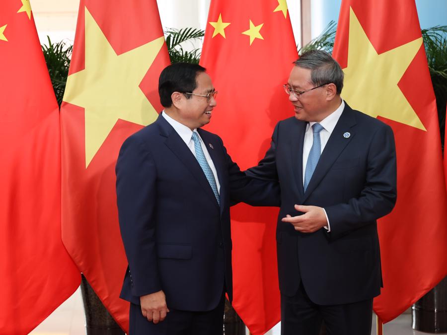 Hai Thủ tướng b&agrave;y tỏ vui mừng v&agrave; đ&aacute;nh gi&aacute; cao những tiến triển trong quan hệ Việt - Trung. Ảnh:VGP.