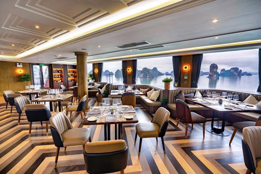 Ambassador Cruise II features spacious sundecks across two floors that total 324 sq m and 250 sq m, affording 360-degree vistas of Ha Long Bay.