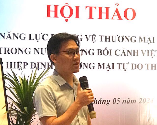 &Ocirc;ng Đặng Xu&acirc;n T&acirc;m, Ch&aacute;nh Văn ph&ograve;ng Cục Ph&ograve;ng vệ thương mại tr&igrave;nh b&agrave;y tham luận tại hội thảo. Ảnh: Ng&ocirc; Anh Văn.