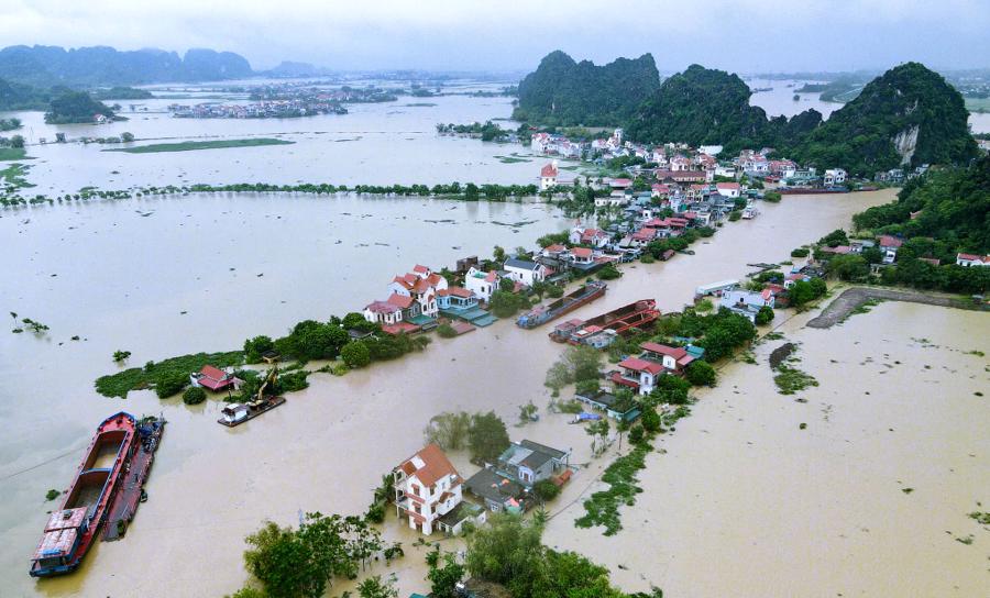 Ninh Bình dừng lệnh di dân do mực nước lũ trên sông Hoàng Long rút - Ảnh 1