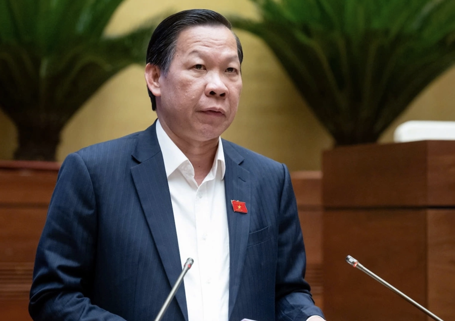 Ông Phan Văn Mãi ,Chủ nhiệm Ủy ban Kinh tế và Tài chính trình bày báo cáo thẩm tra dự Luật Ngân sách Nhà nước (sửa đổi), chiều 14/5. Ảnh: Trung tâm báo chí Quốc hội