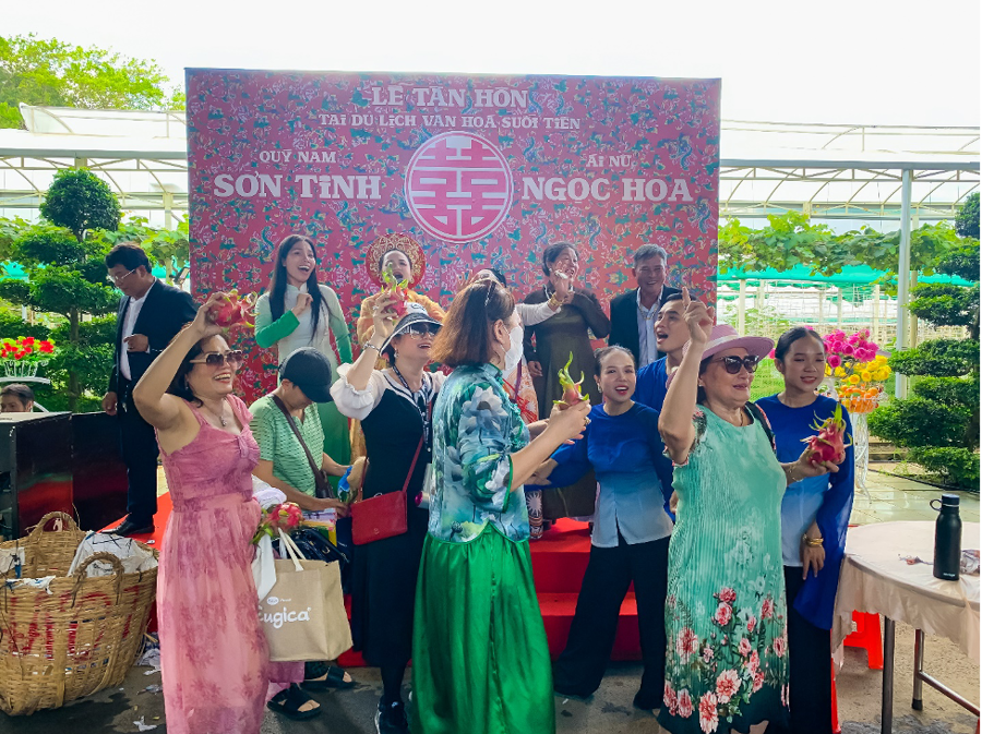 Visitors join the musical “A Wedding on the Mekong Islet” at Suoi Tien Theme Park